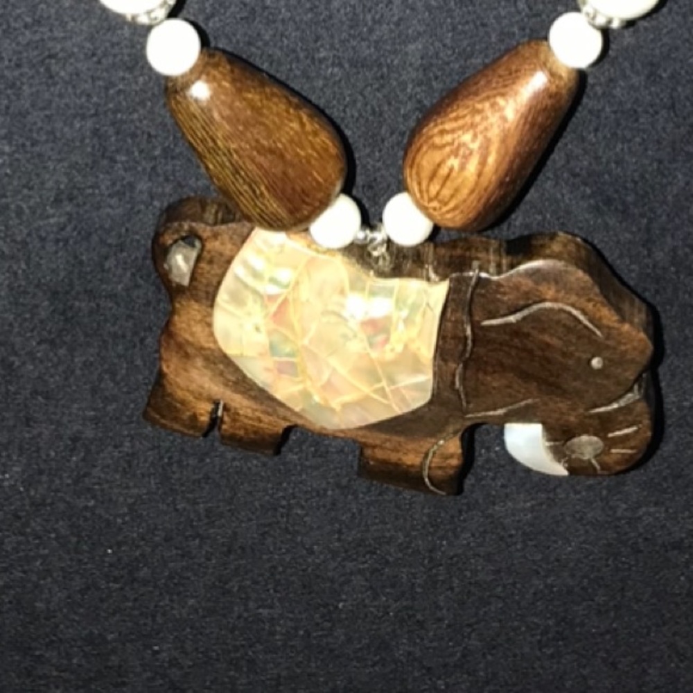 Wood carved elephant with mother of pearl drape. NWOT